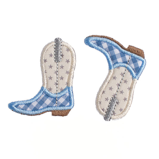 Close up of Deacon Lane's Shooting Stars Kickin' Cowboy Boot applique in cream, light blue, and grey.