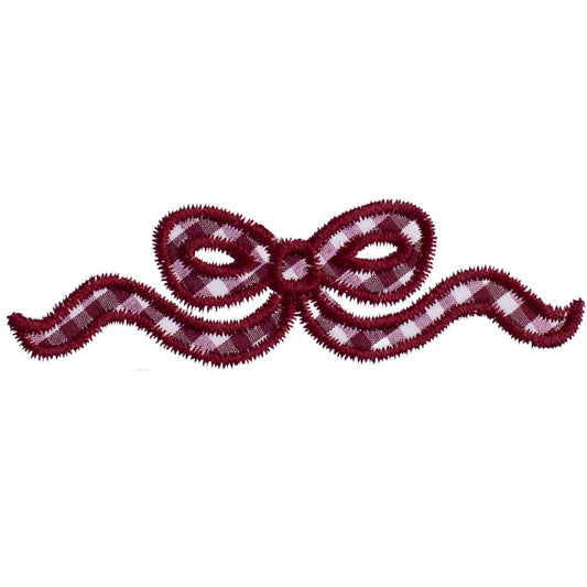 Close up of Deacon Lane's maroon check applique bow design