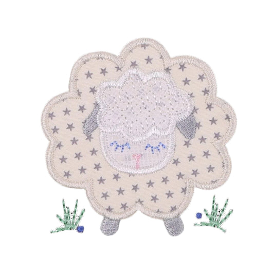 close up picture of Deacon Lane's Fluffy Grey Sheep Applique in shades of cream, grey, and white