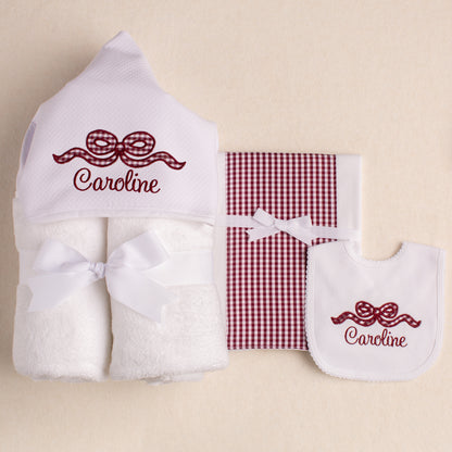 close up of 3 piece gift set for Aggie parents with a maroon appliqued bow with an embroidered name
