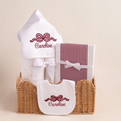 3 piece baby gift set in Aggie colors personalized with an appliqued maroon bow and an embroidered name