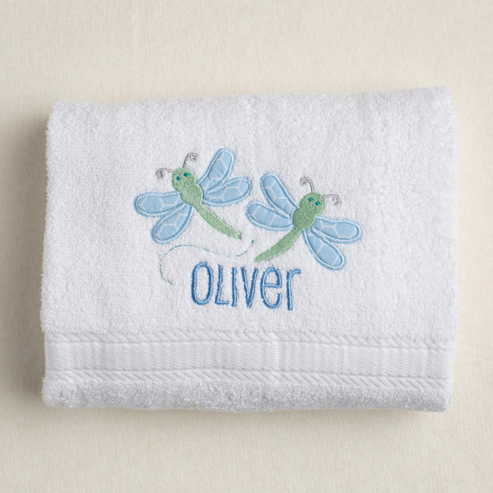 White cotton bath towel for all ages through toddler with a pair of appliquéd dragonflies with a personalized name