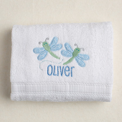 White cotton bath towel for all ages through toddler with a pair of appliquéd dragonflies with a personalized name