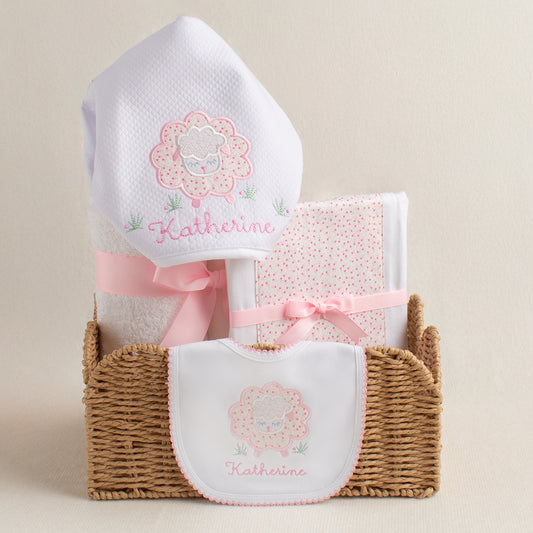 Boutique baby gift set with hooded towel, burp pad made from a cloth diaper, and a picot trimmed bib.