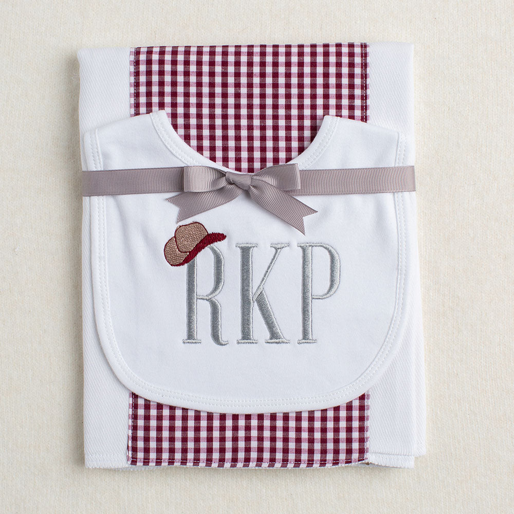 2 piece gift set with a bib with a western embroidery paired with a Texas A + M maroon check burp pad