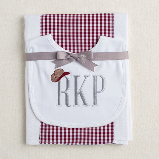 2 piece gift set with a bib with a western embroidery paired with a Texas A + M maroon check burp pad
