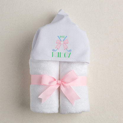 Crossed Clubs with Bow