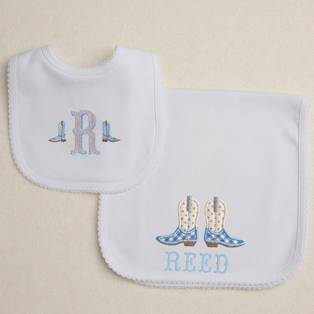Two piece Western themed gift set with applique cowboy boot burp pad and a bib with a Wester two-toned drop shadow font.
