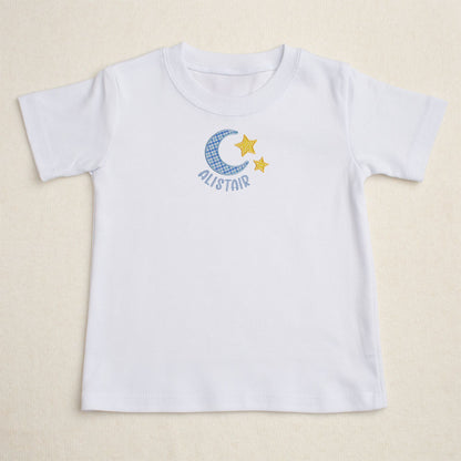 white t-shirt with Deacon Lane's exclusive moon and star applique from their Bella Notte collection.  Big brother boutique baby gift.
