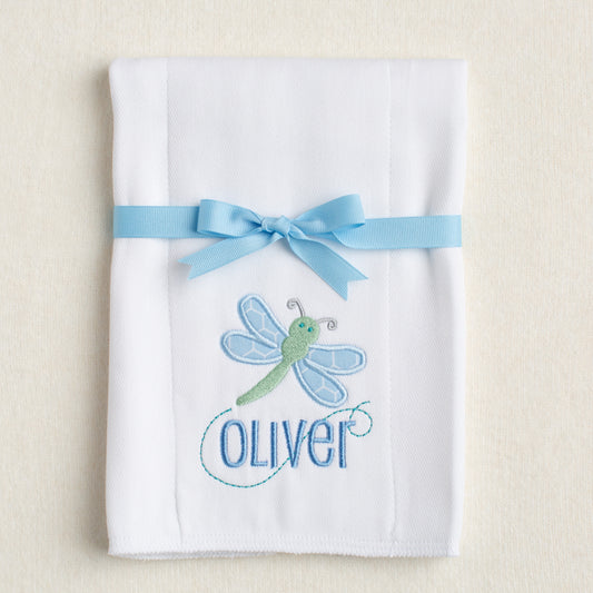 White cotton burp cloth/diaper appliqued by hand with blue hex fabric and green accents.  Folded and tied neatly with grosgrain for easy gift giving
