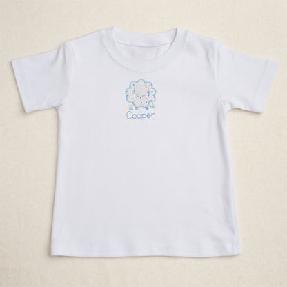 premium cotton t-shirt with hand made appliqued sheep and a personalized embroidered name for a personalized boutique children's gift