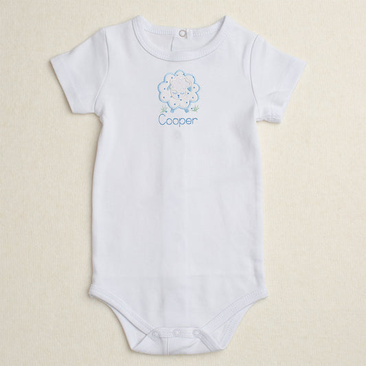 All cotton bodysuit with short sleeves and a blue sheep applique that can be personalized with embroidery