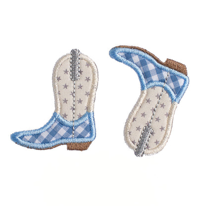 Close up of Deacon Lane's Shooting Stars Kickin' Cowboy Boot applique in cream, light blue, and grey.