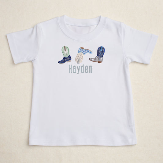 White t-shirt with embroidered cowboy boots and the personalized embroidered name.