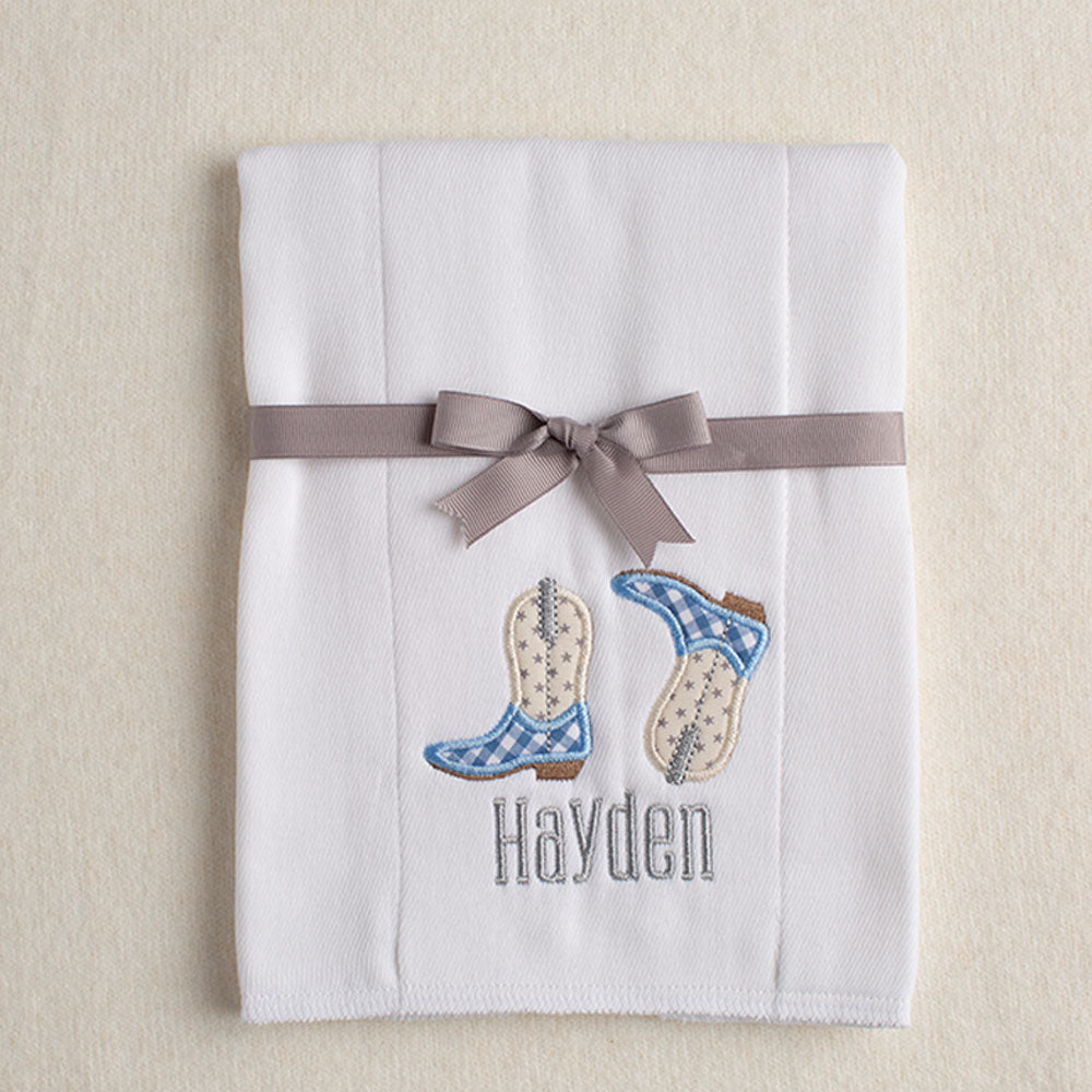 Boutique baby burp pad with cowboy boot appliques in light blue, grey, and cream with personalized embroidered name