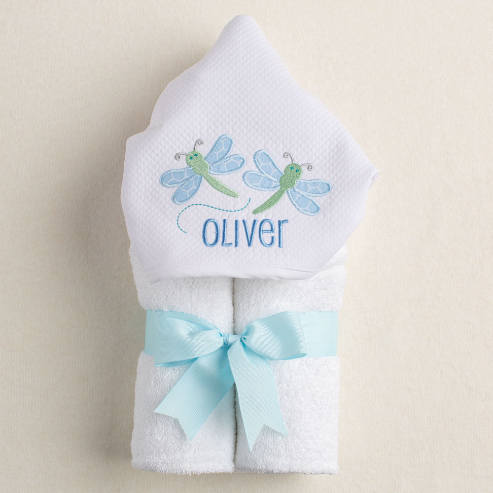 Hooded towel with applique  dragonflies and personalized with a name.