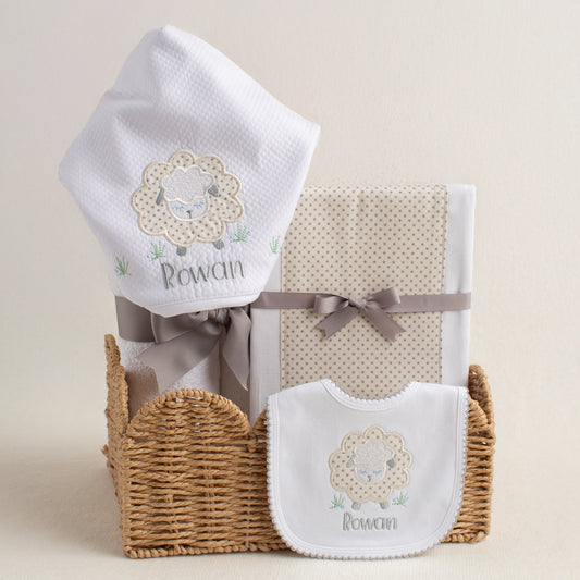 Personalized baby gift set with a hooded towel, burp pad, and bib with  grey sheep applique with a personalized embroidered name