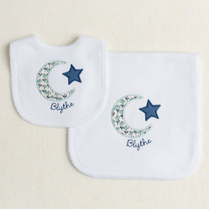 Boutique baby gift set with appliqued moon and star motif made from a Liberty reminiscent print in navy and seafoam