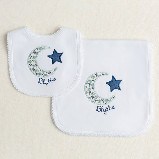 Boutique baby gift set with appliqued moon and star motif made from a Liberty reminiscent print in navy and seafoam