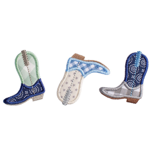 Close-up shot showing detail of the appliqued cowboy boots and the beautiful stitching.