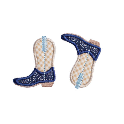 intricate hand made cowboy boot applique made from premium fabrics in shades of navy, light blue, and khaki
