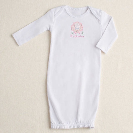 white cotton newborn baby gown with hand made pink floral sheep applique with convenient zipper opening at the bottom