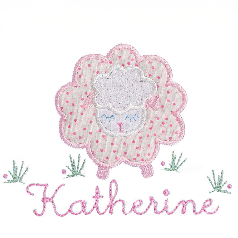original hand made applique of a sheep from a delicate pink floral fabric 
