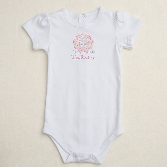 All cotton bodysuit with short puff sleeves and a pink sheep applique that can be personalized with embroidery