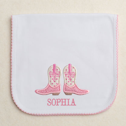 Picot trimmed burp pad with pink cowgirl boot applique and an embroidered name