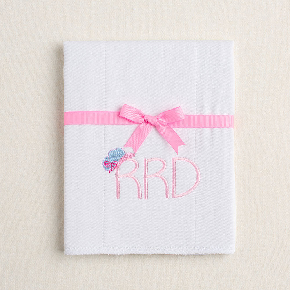 white burp pad with western theme monogram with embroidered cowgirl hat