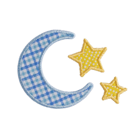 Close up of Deacon Lane's exclusive moon and stars applique from their Bella Notte collection.  Boutique baby designs.