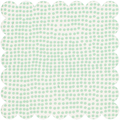 Cream ground with irregular shaped green polka dots