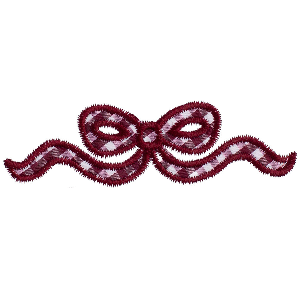 Close up Deacon Lane's A + M maroon applique bow