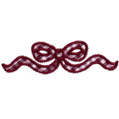 Close up Deacon Lane's A + M maroon applique bow