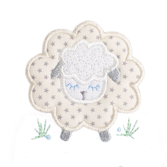 Close up of Deacon Lane's Grey Fluffy Sheep applique in cream, grey and white