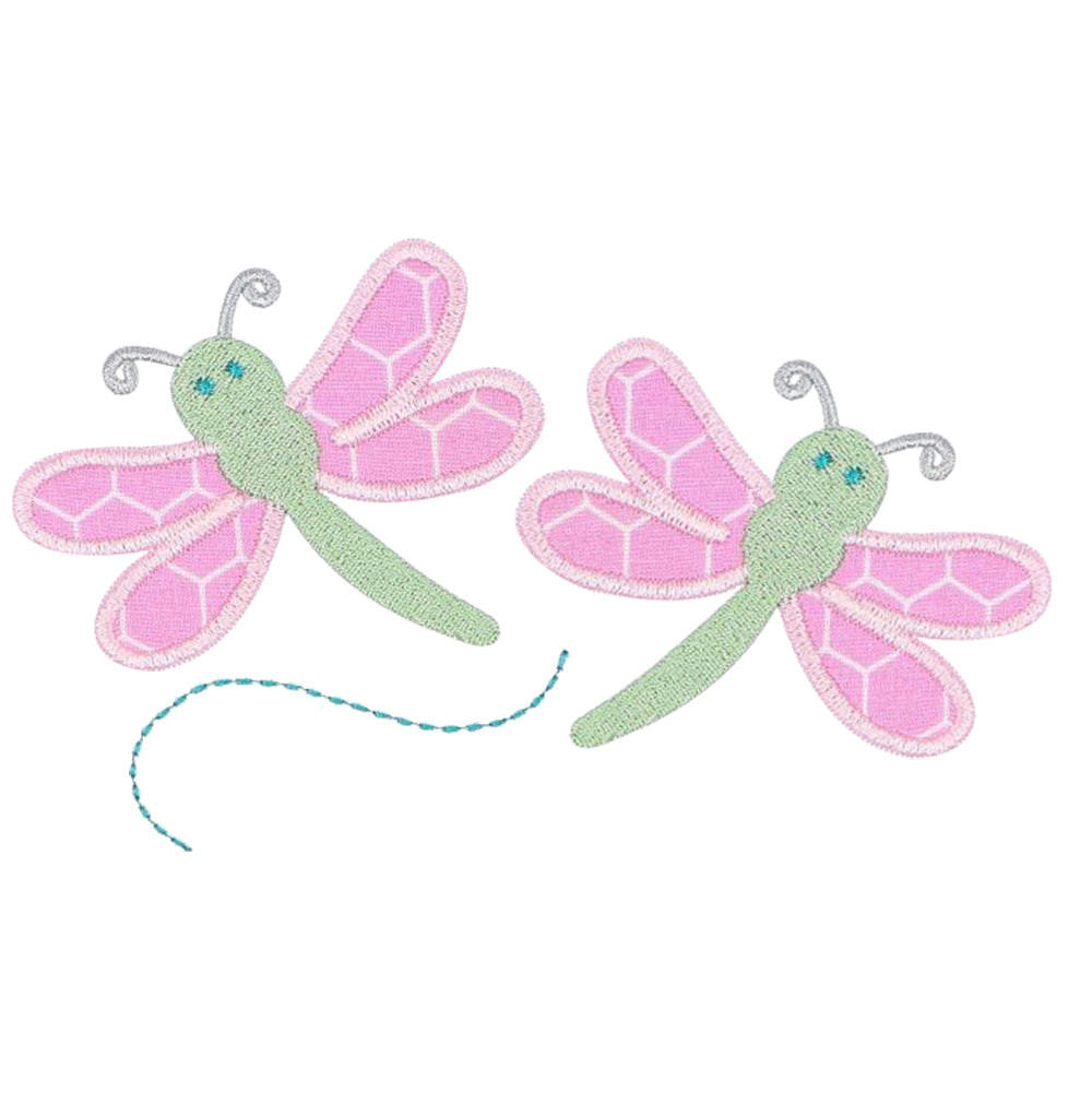 Close-up of two pink and green dragonfly appliques on a white background in an exclusive Deacon Lane design