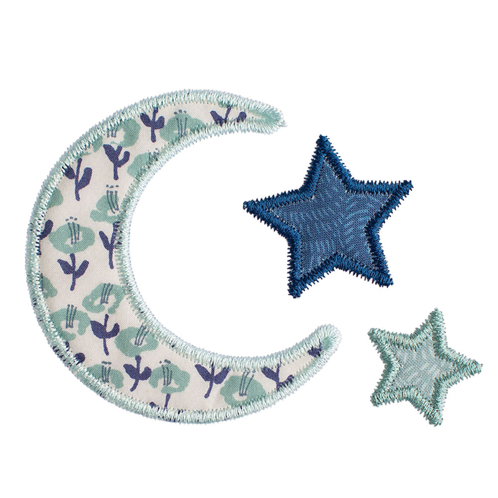 Close-up of Deacon Lane Bella Notte motif in seafoam/sage and navy featuring a floral reminiscent of a Liberty of London print.