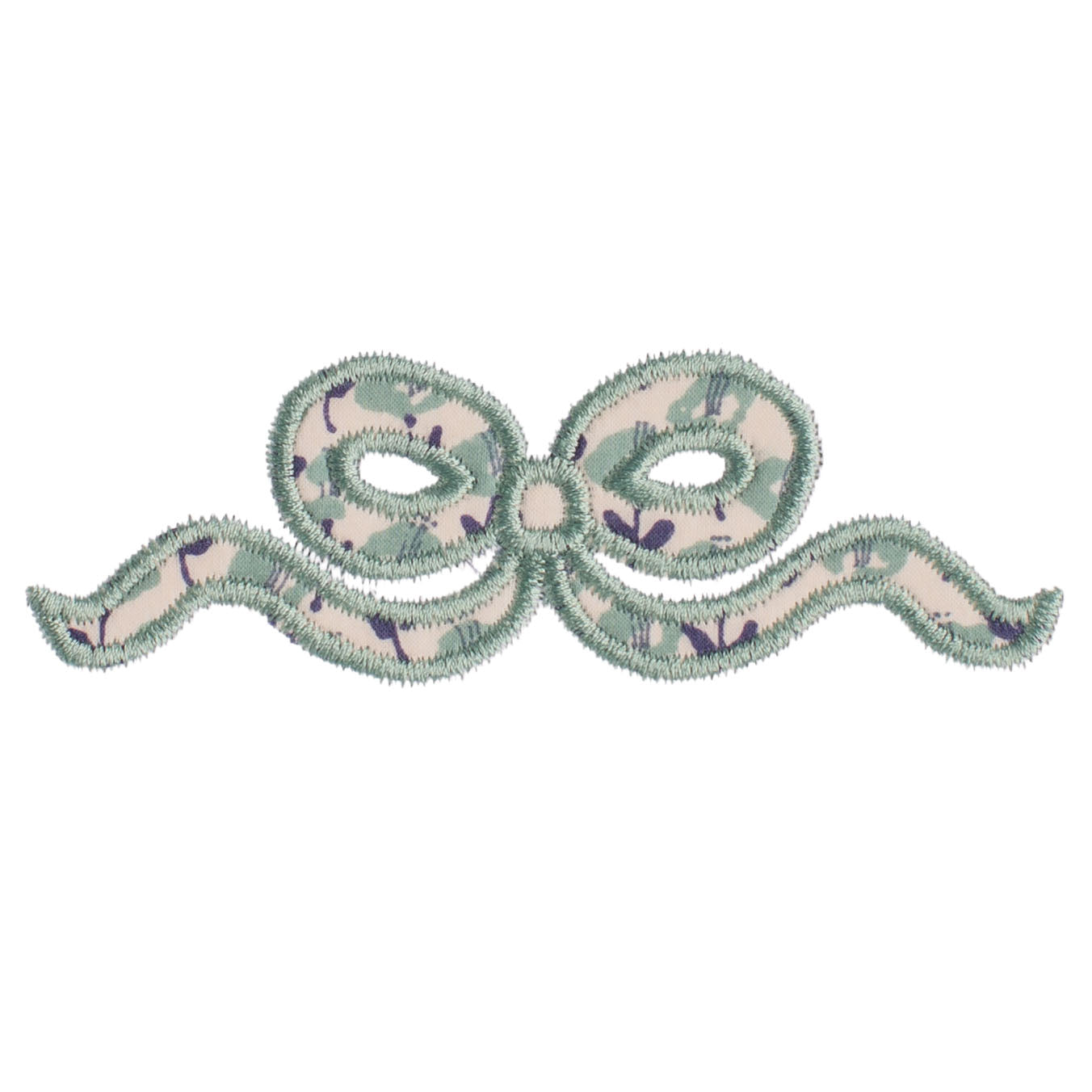 Close up of Deacon Lane's applique bow in a navy and seafoam/sage floral.