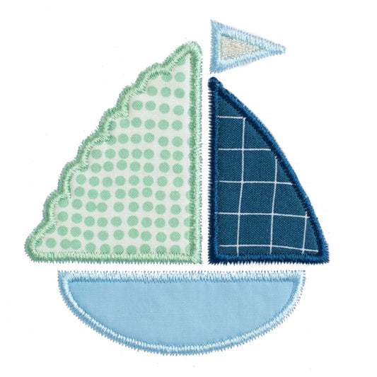 close up of Deacon Lane's signature boy sailboat applique in shades of blue, green, and cream